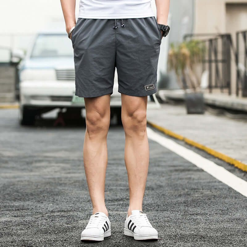 2020 summer men's shorts Korean version of the trend summer sports loose five points casual speed trousers Taobao