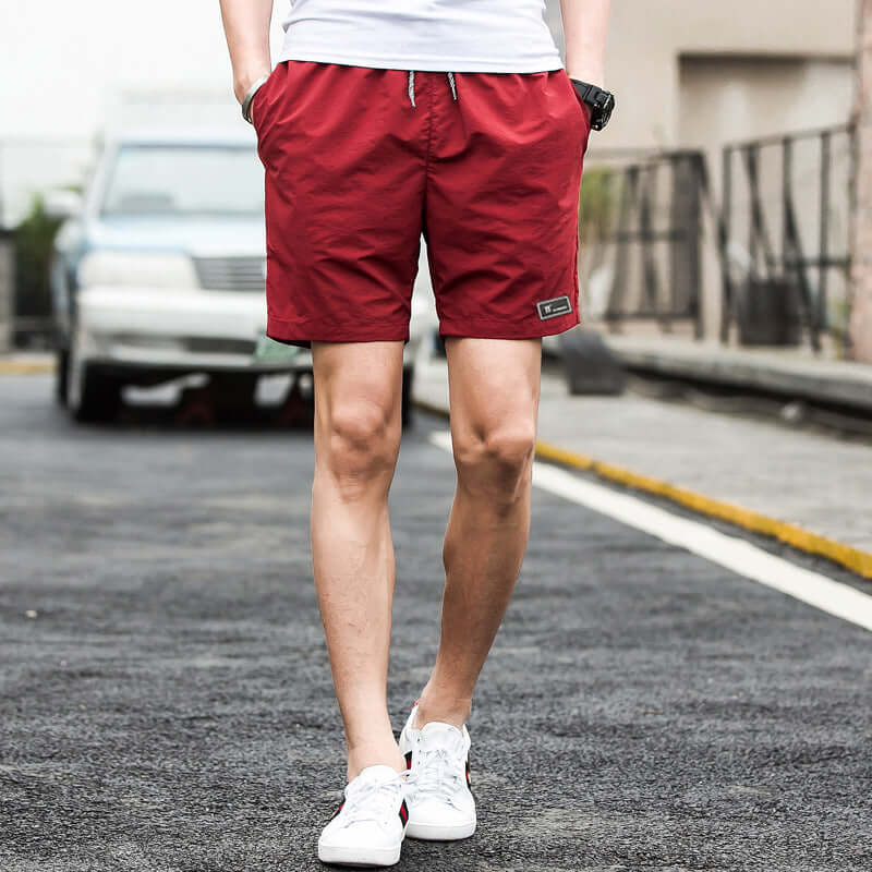 2020 summer men's shorts Korean version of the trend summer sports loose five points casual speed trousers Taobao