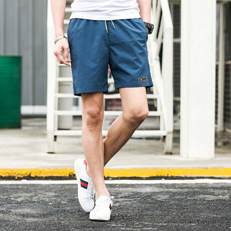 2020 summer men's shorts Korean version of the trend summer sports loose five points casual speed trousers Taobao