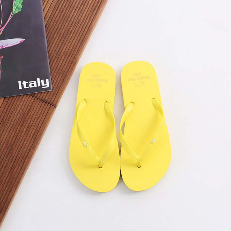 Solid color wild couples flip toile shoes summer human words hairdressing men and women beach shoes women's sandwich shoes