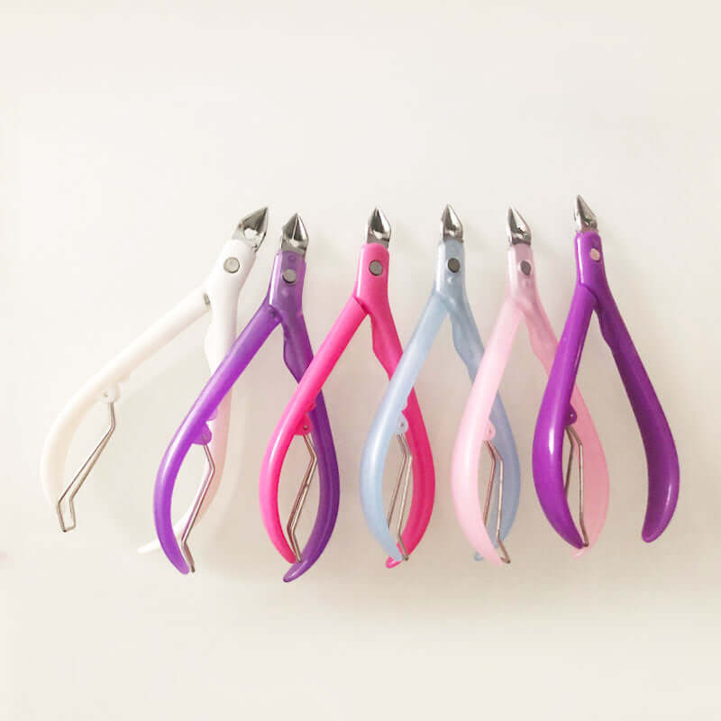 Factory spot Wholesale plastic handle dead leather pliers trencoune nail scissors a beautiful tool dead skin scissors