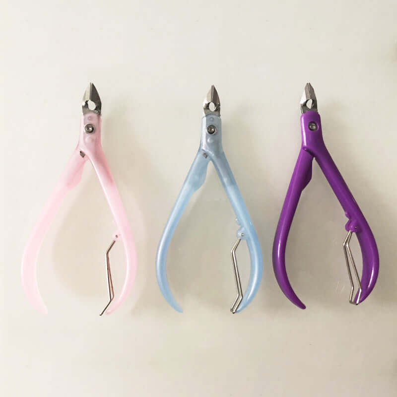 Factory spot Wholesale plastic handle dead leather pliers trencoune nail scissors a beautiful tool dead skin scissors