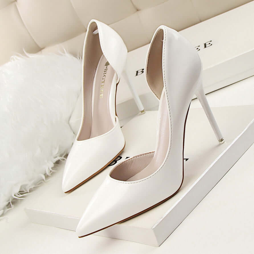 638-5 Korean version of the fashion simple and stiletto high-heeled patent leather shallow mouth sharp hollow sexy thin high heel shoes single shoes