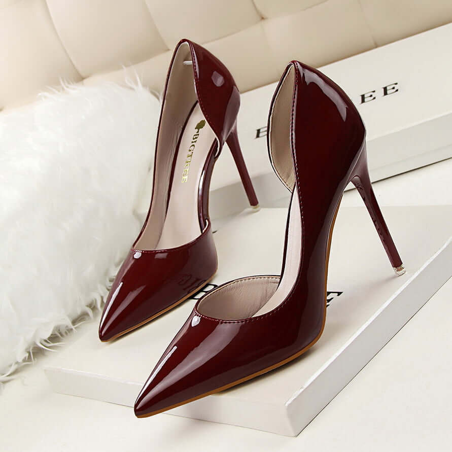 638-5 Korean version of the fashion simple and stiletto high-heeled patent leather shallow mouth sharp hollow sexy thin high heel shoes single shoes