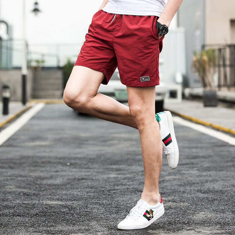 2020 summer men's shorts Korean version of the trend summer sports loose five points casual speed trousers Taobao