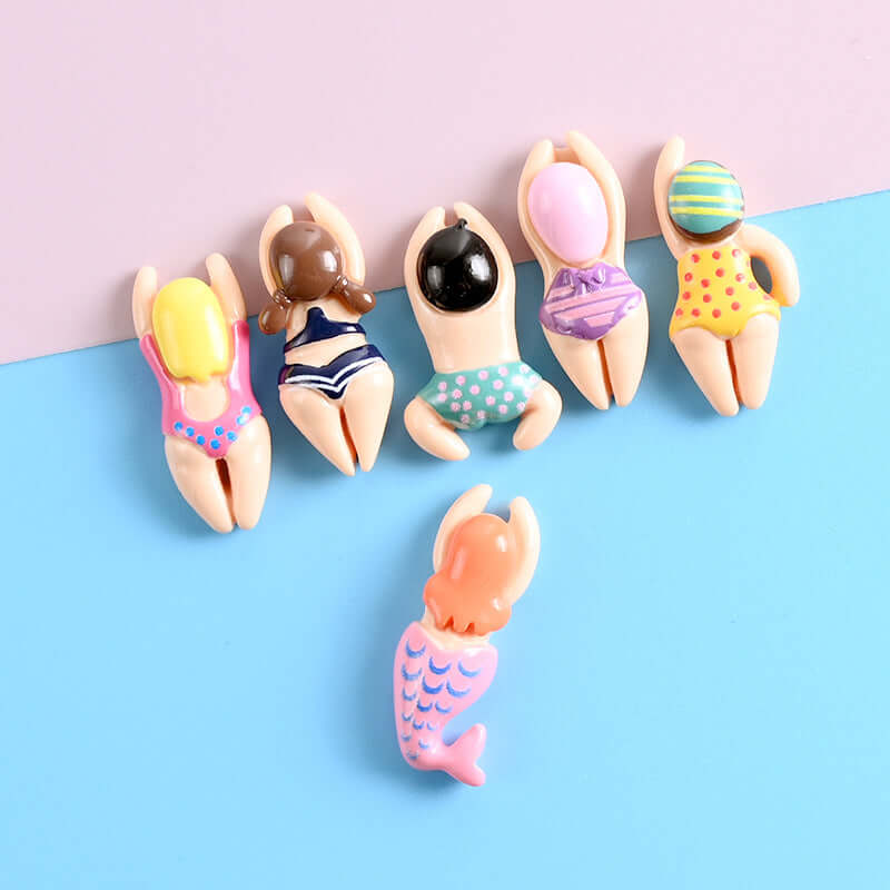 Resin cartoon swimming small man drop glue cream mobile shell accessories hairpin refrigerator stickers handmade DIY brooch material