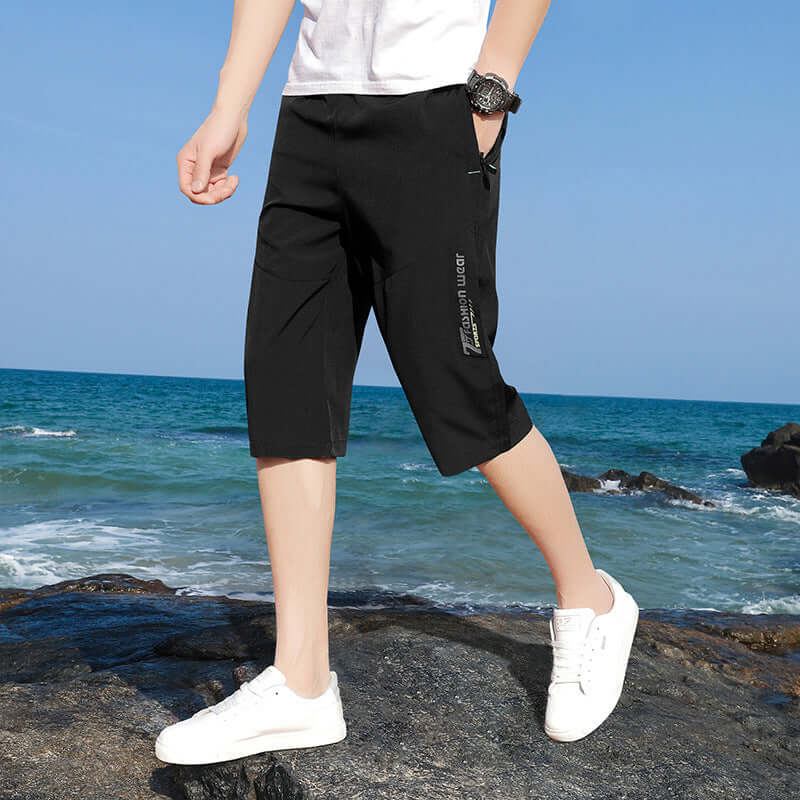 Summer new shorts male Korean version of the trend sports elastic large size seven pants youth men's casual 7 points pants