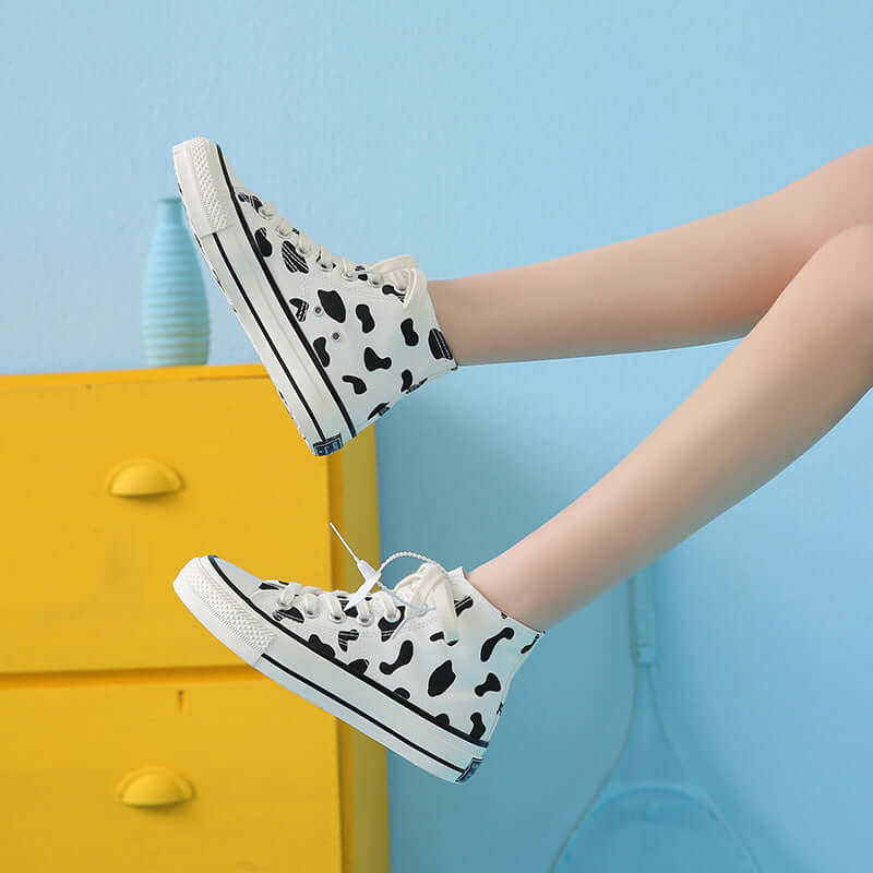 Spring new canvas shoes fashion Korean high-top lace-up female students casual trendy black and white cow pattern sneakers