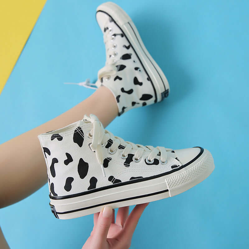 Spring new canvas shoes fashion Korean high-top lace-up female students casual trendy black and white cow pattern sneakers